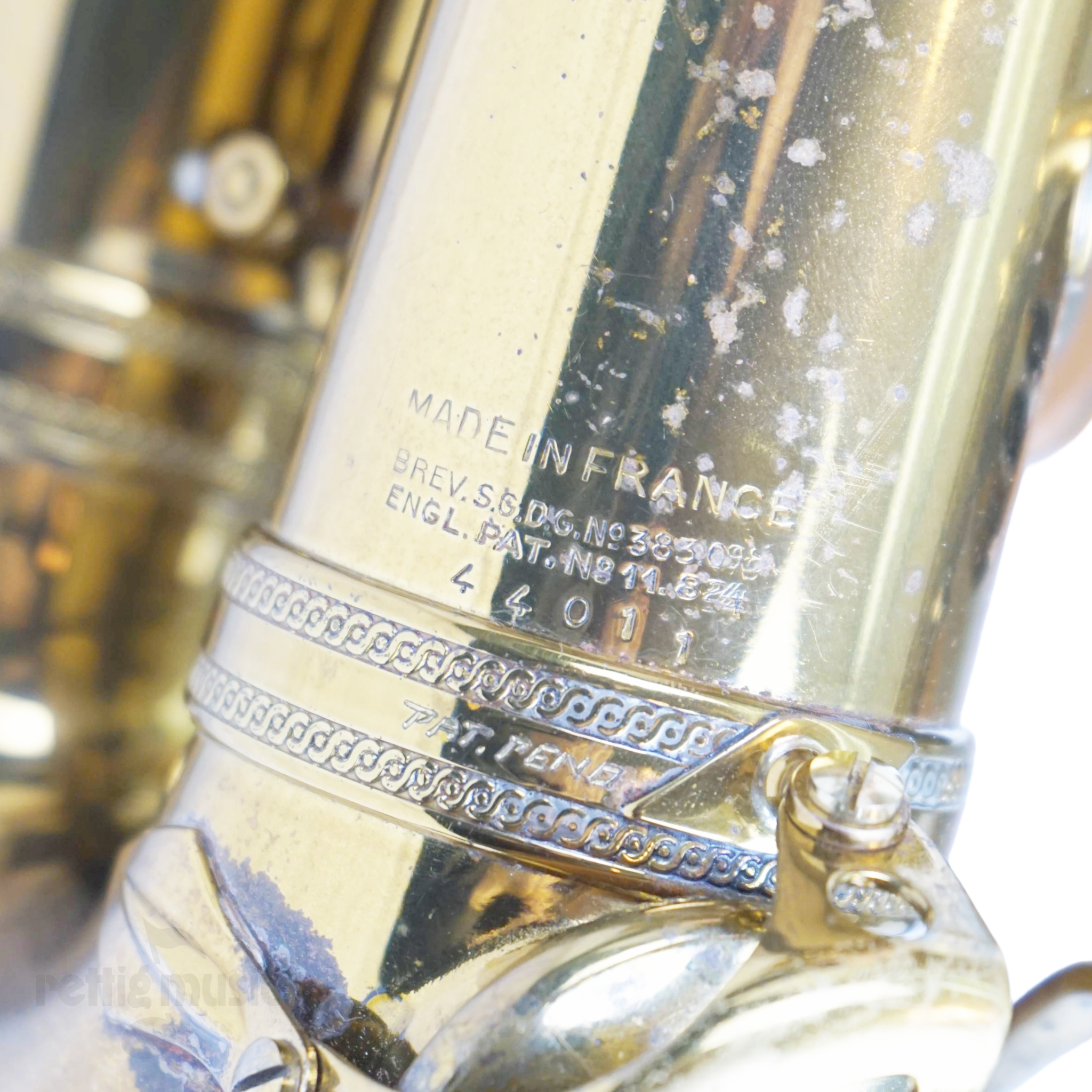 Closeup of Vintage Selmer Paris Super Action Alto Saxophone Engraving