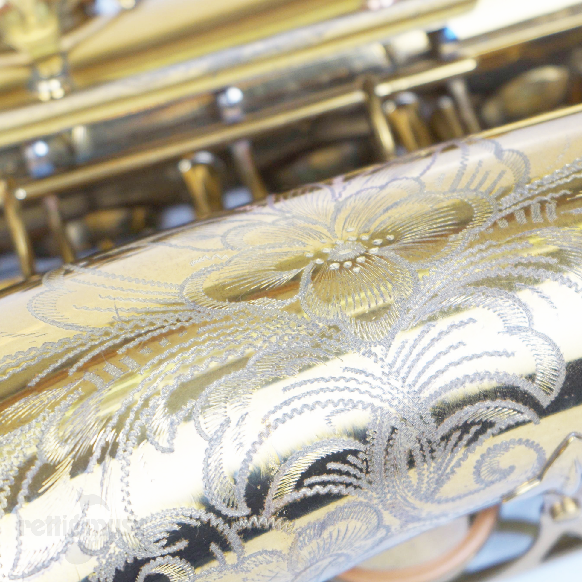 Closeup of Vintage Selmer Paris Super Action Alto Saxophone Engraving
