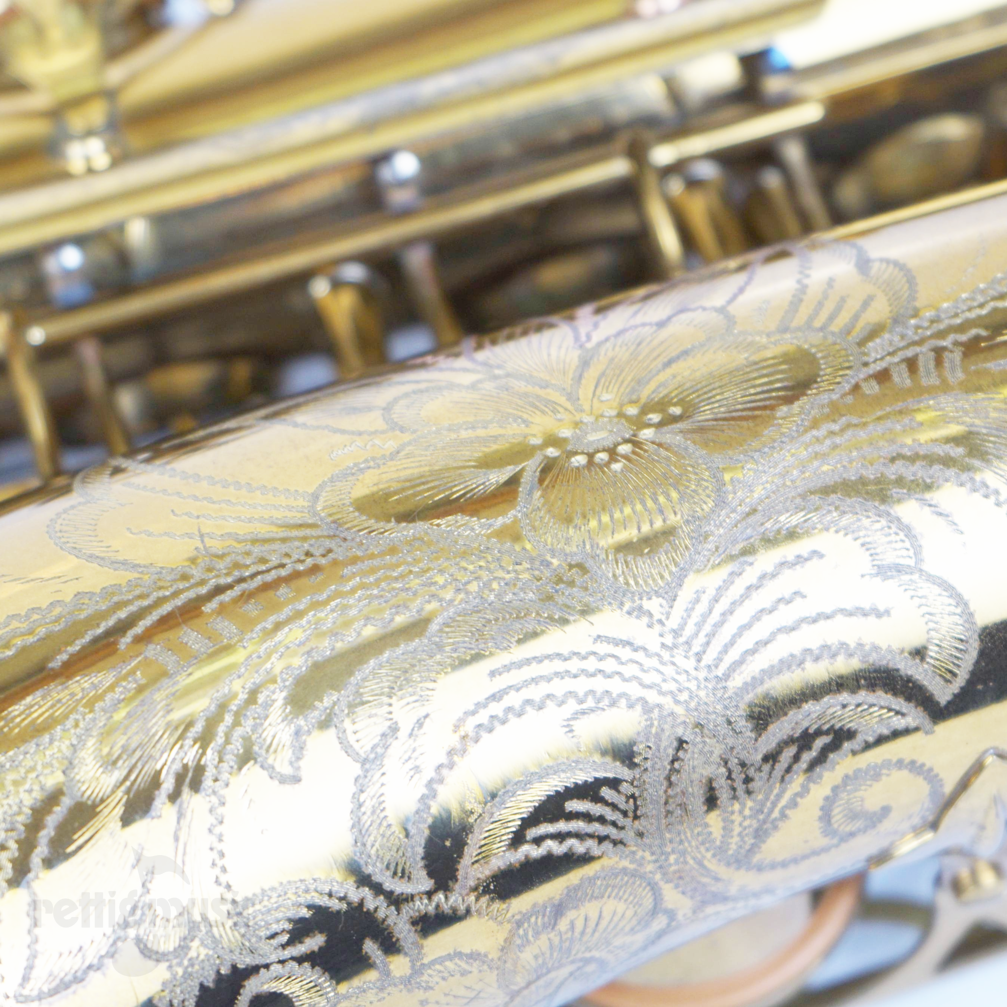 Closeup of Vintage Selmer Paris Super Action Alto Saxophone Engraving