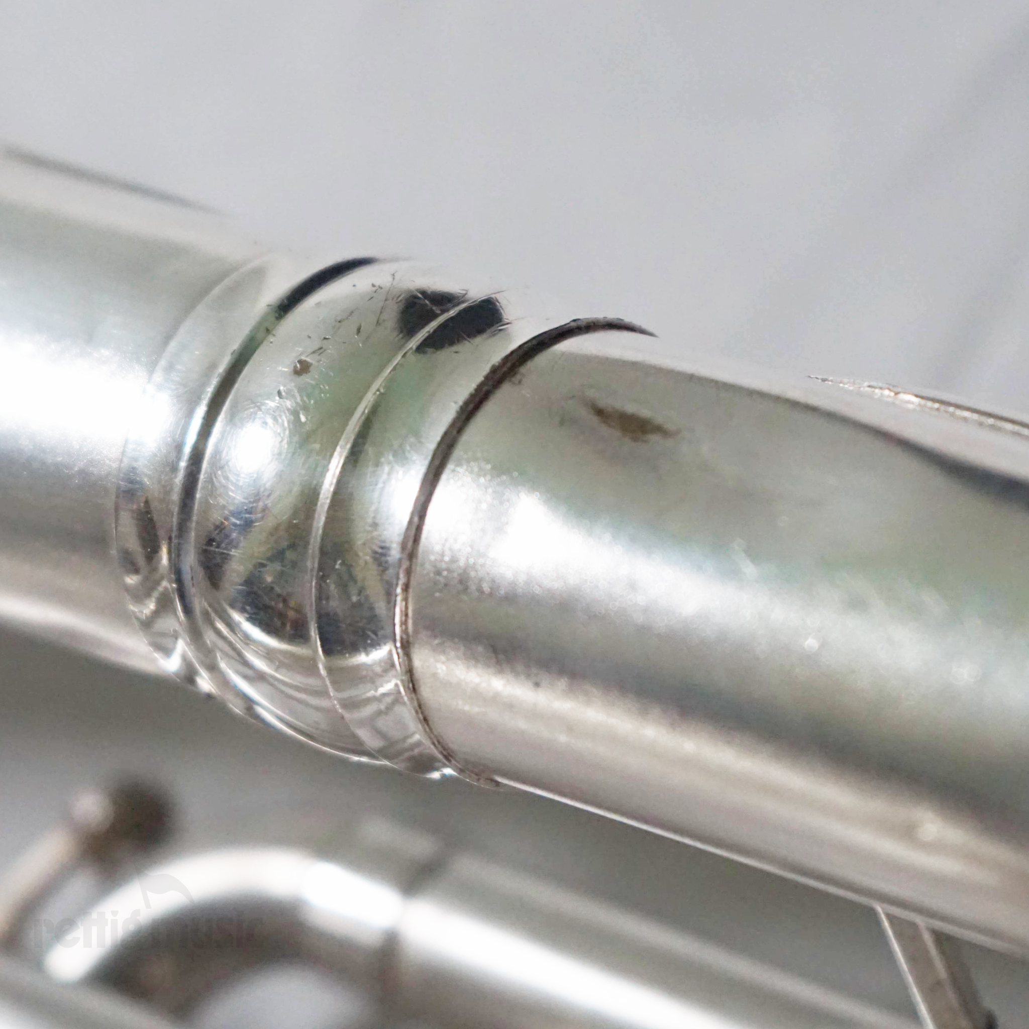 Close Up of Vintage Satin Silver King Baritone